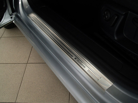 Zestaw (Nakładka na zderzak tylny + nakładki progowe) do Volkswagen Passat B6 Kombi